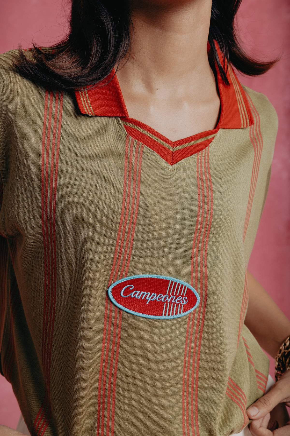 Girl wearing the Campeones a vintage-style shirt